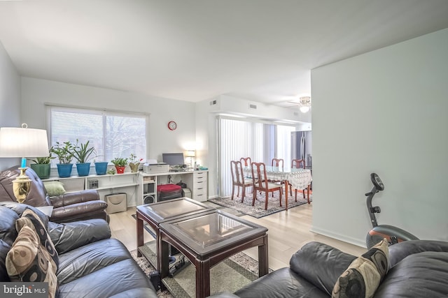 living room featuring light wood-type flooring