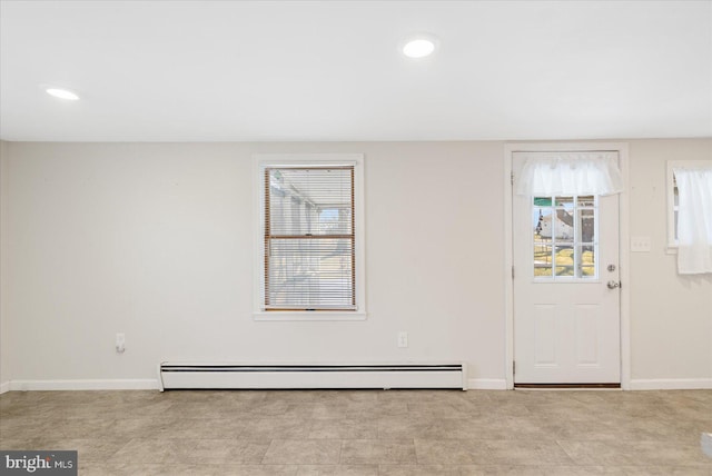 foyer with a baseboard radiator