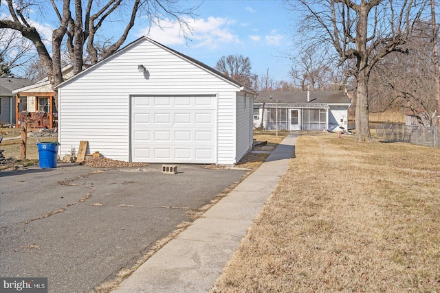 garage with a yard