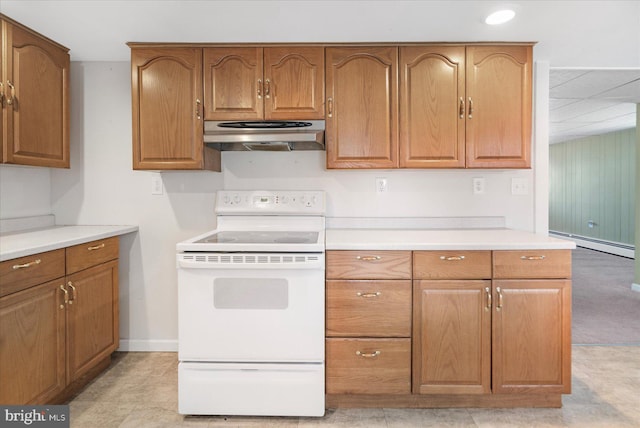 kitchen featuring white electric range oven and baseboard heating