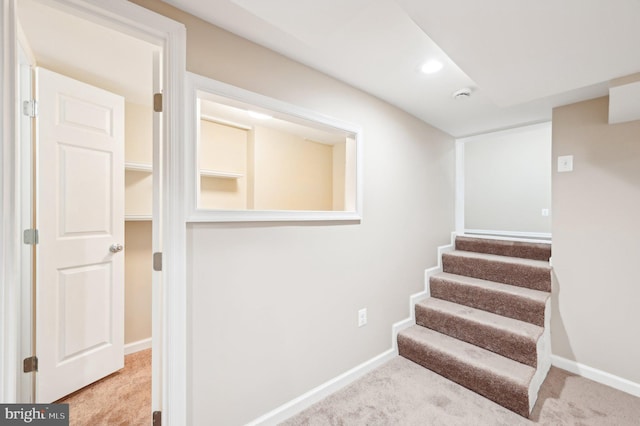 stairs featuring baseboards, carpet flooring, and recessed lighting