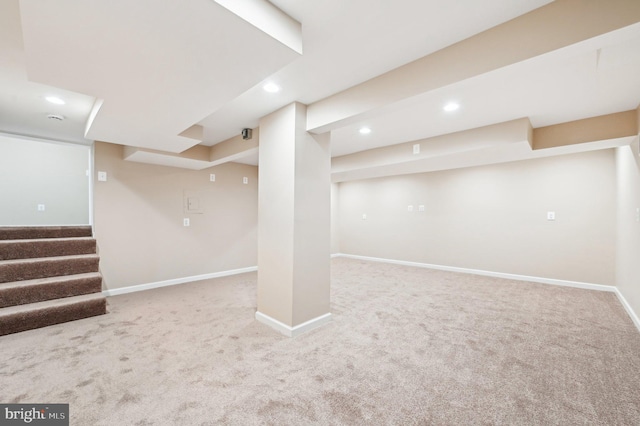 finished below grade area featuring recessed lighting, carpet flooring, and baseboards