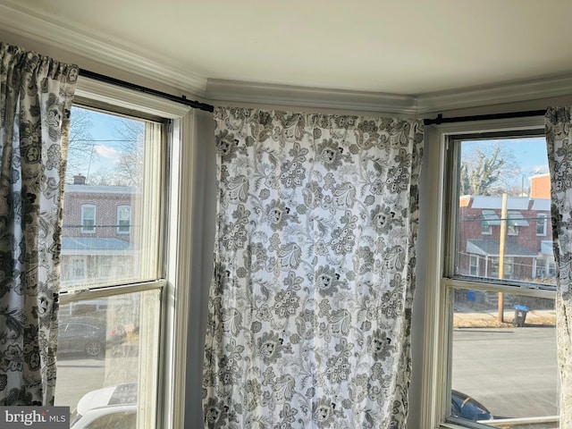 interior space featuring crown molding