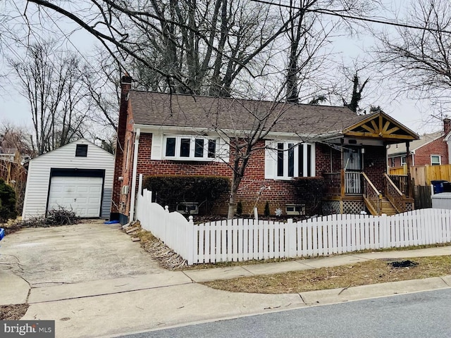 view of front facade with an outbuilding and a garage