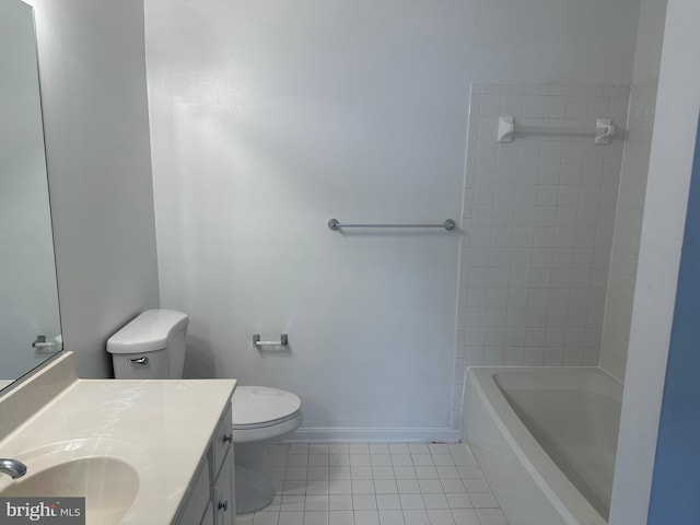 bathroom with shower / washtub combination, toilet, vanity, tile patterned flooring, and baseboards