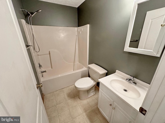 full bathroom featuring bathing tub / shower combination, vanity, and toilet