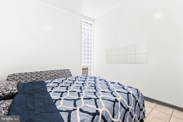 unfurnished bedroom with light tile patterned floors