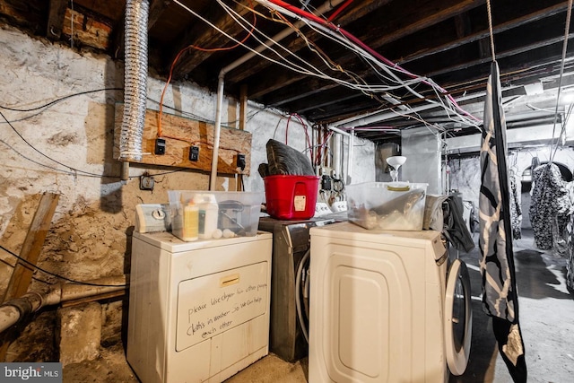 basement featuring washing machine and dryer