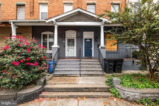 entrance to property with covered porch