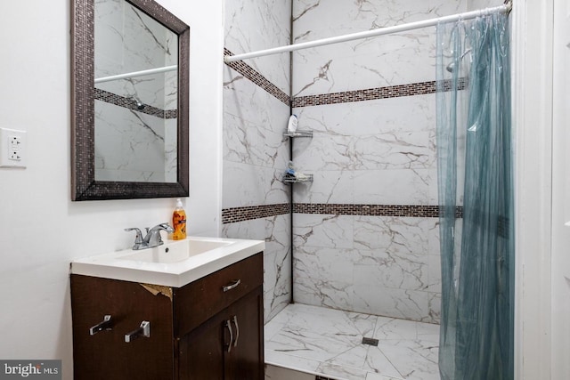 bathroom with vanity and walk in shower