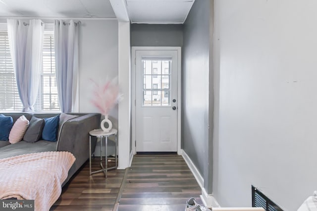 doorway featuring dark hardwood / wood-style floors