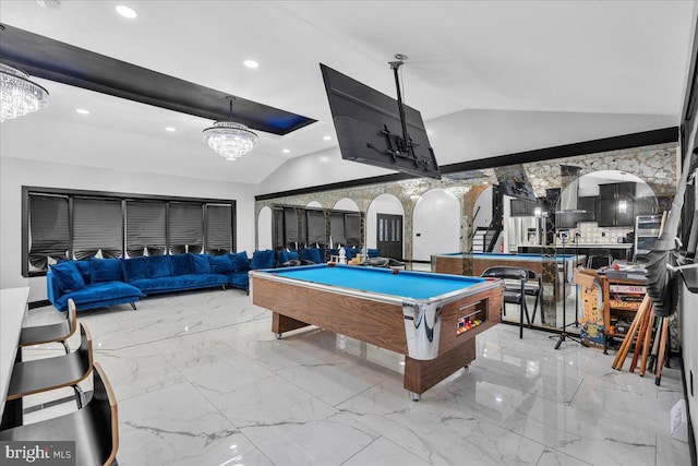 recreation room with lofted ceiling and billiards