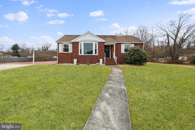 view of front of house with a front lawn