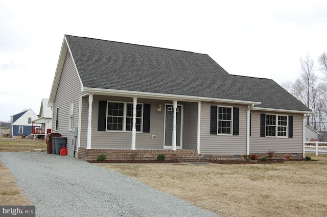 view of front of property featuring crawl space, fence, and roof with shingles