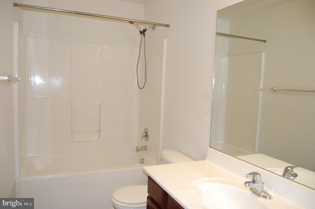 full bath with tub / shower combination, vanity, and toilet