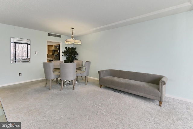 view of carpeted dining room