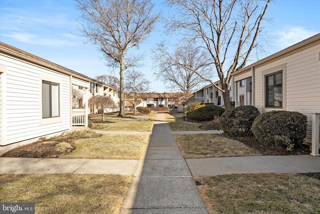 view of yard featuring a residential view