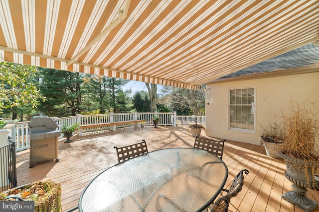 wooden terrace with grilling area