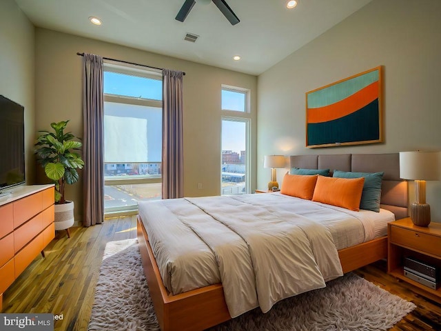 bedroom with hardwood / wood-style flooring and ceiling fan