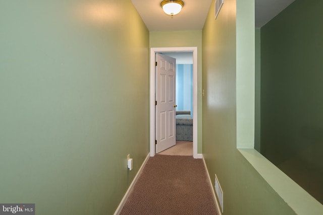 hallway with light carpet