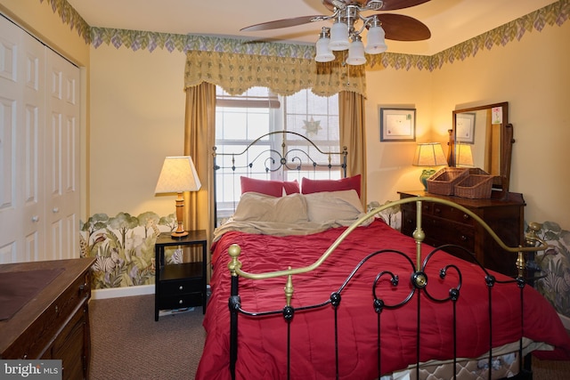 bedroom with carpet flooring, ceiling fan, and a closet