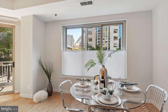 dining area featuring light hardwood / wood-style floors