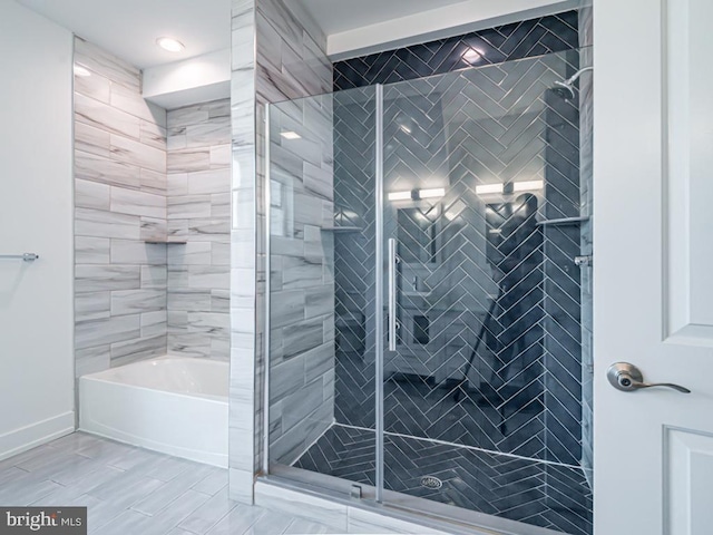 bathroom with independent shower and bath