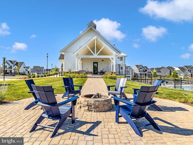 view of patio with a fire pit