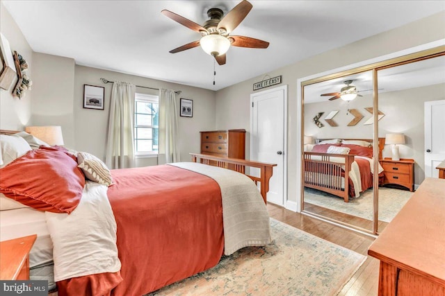 bedroom featuring a closet, ceiling fan, and hardwood / wood-style floors