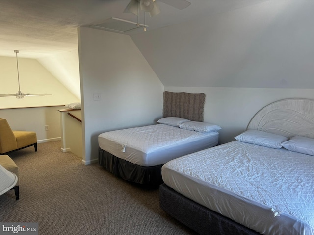 carpeted bedroom with a ceiling fan, vaulted ceiling, and baseboards