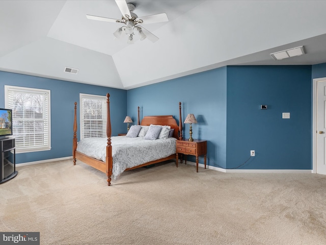 bedroom featuring visible vents, carpet flooring, baseboards, and vaulted ceiling