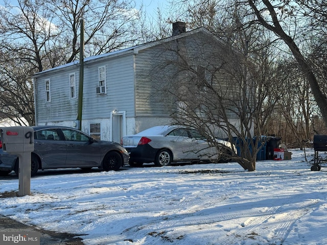 view of snow covered property