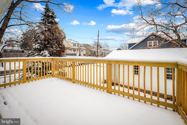 view of snow covered deck