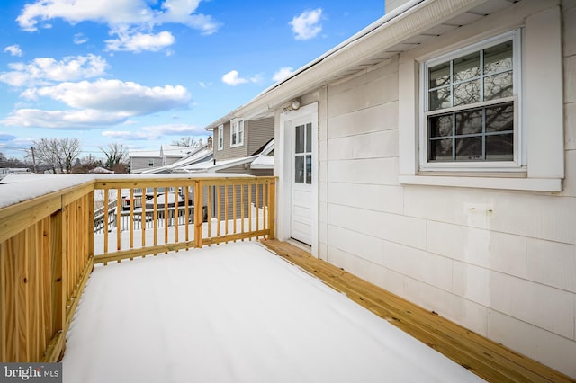 view of snow covered deck