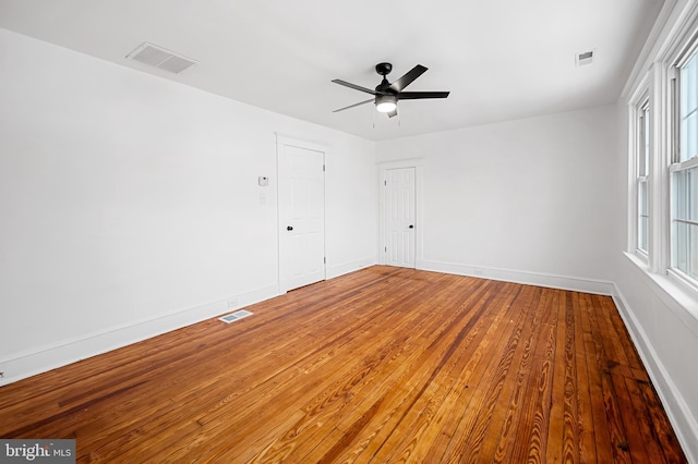 unfurnished room featuring wood-type flooring and ceiling fan