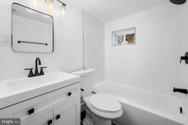 full bathroom with vanity, toilet, and tiled shower / bath combo