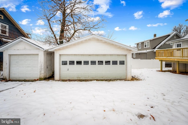 view of snow covered garage