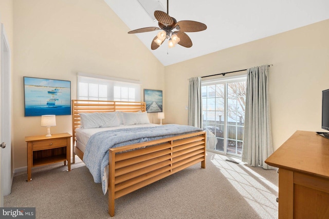 carpeted bedroom with access to exterior, vaulted ceiling, and ceiling fan