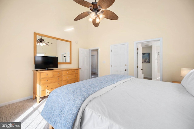 bedroom with high vaulted ceiling, ceiling fan, and carpet flooring