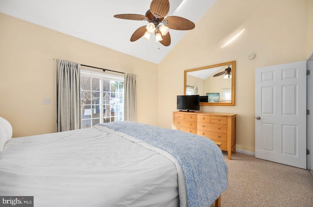 carpeted bedroom featuring ceiling fan and lofted ceiling