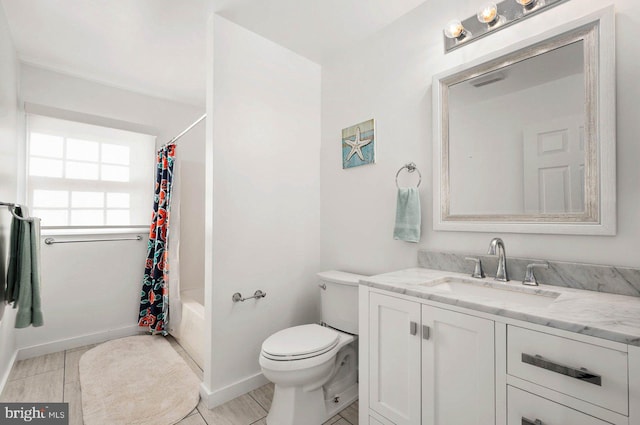 full bathroom with vanity, shower / bathtub combination with curtain, and toilet