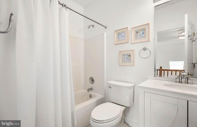 full bathroom featuring vanity, toilet, and shower / tub combo