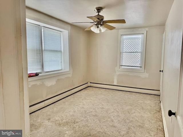 unfurnished room featuring light carpet and ceiling fan