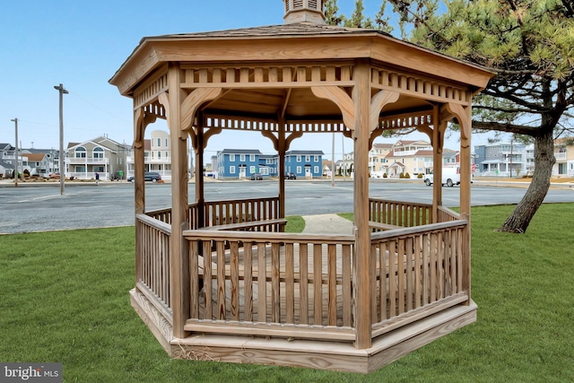 exterior space with a yard and a gazebo