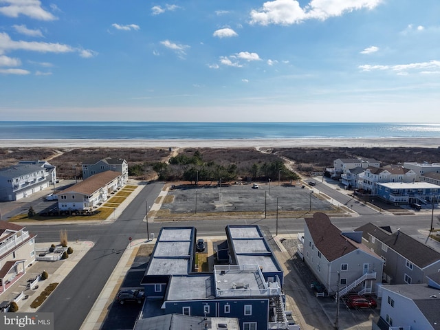 aerial view with a view of the beach and a water view