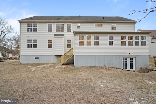 rear view of property featuring french doors