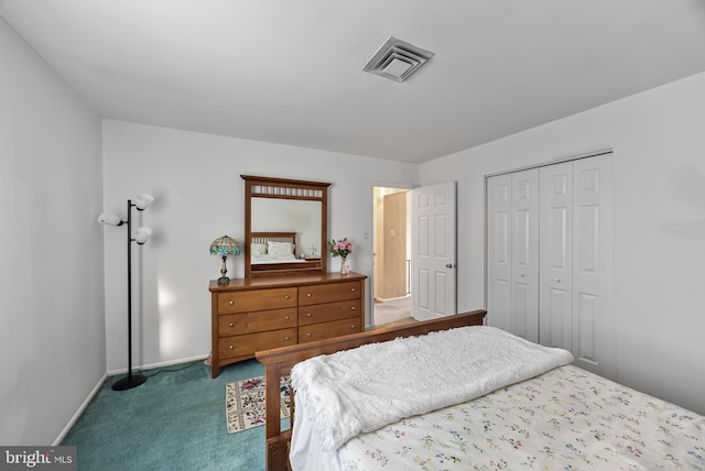 carpeted bedroom featuring a closet