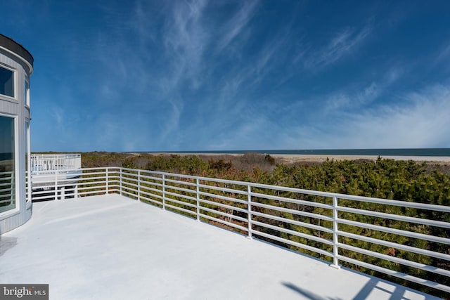 view of patio featuring a water view