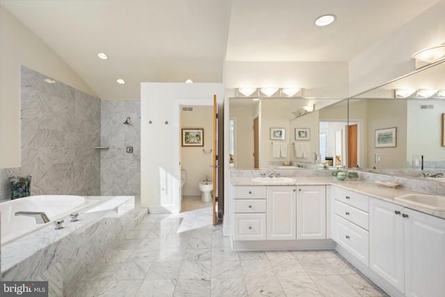 bathroom featuring independent shower and bath, vanity, a bidet, and lofted ceiling