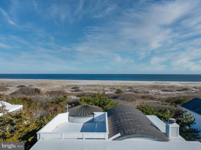 property view of water featuring a beach view